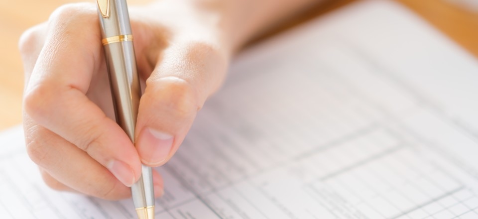 hand-with-pen-application-form.jpg